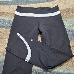 Lululemon Black Leggings Women’s Size 4 Reflective Detail Zip Pocket Activewear